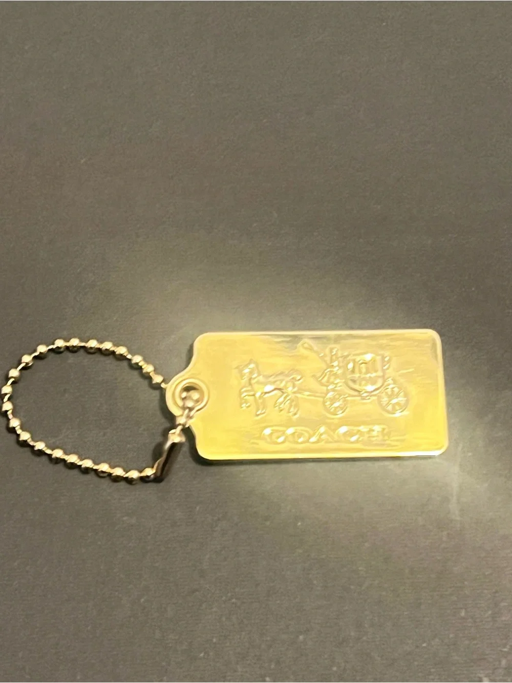 Rare Vintage Coach Gold Tone Embossed Horse & Carriage Dog-Tag Key Holder